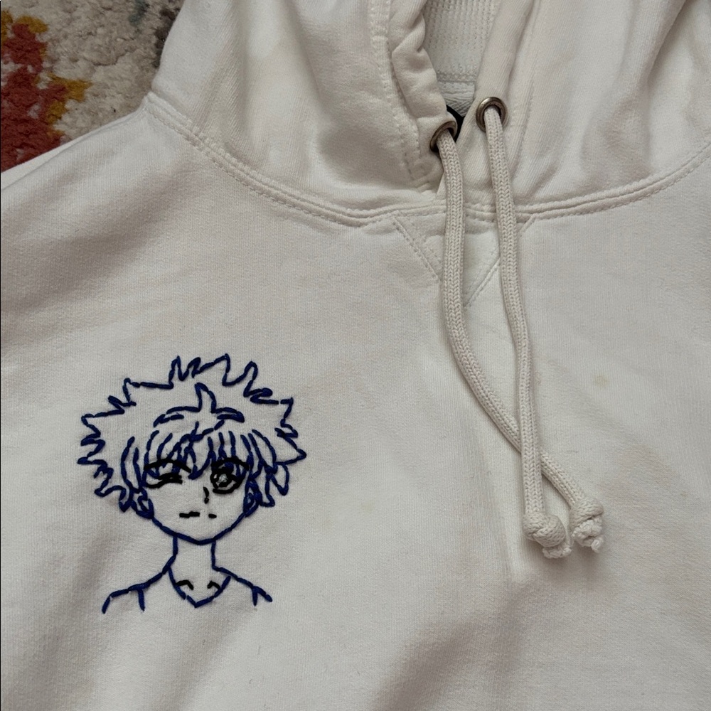 Champs White Hoodie with Navy Embroidered Anime Motif
